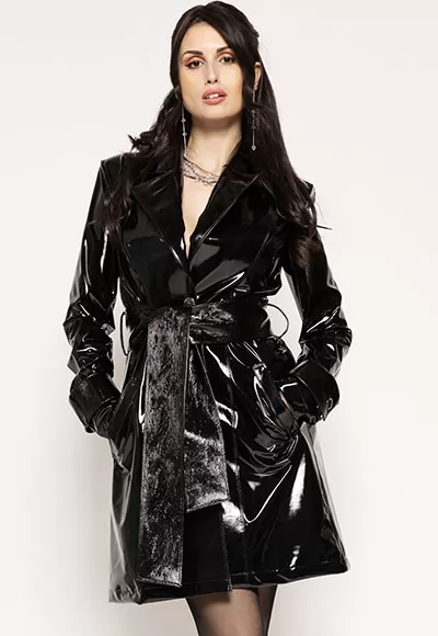 Aradia vinyl trench in black color.  Manufactured in French workshops, signed by renowned fashion designer Patrice Catanzaro, available in size S to 4XL. Composition: 80% Polyester, 12% Polyurethane, 8% Elastane.  Brand Patrice Catanzaro, Collection Tome 18, Reference PC113901T18.2 1 piece.  Patrice Catanzaro, the brand of sexy outfits of very good...
