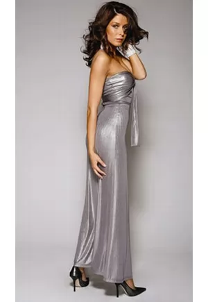 Light up the night in the shimmering and versatile Moonbeam. This sexy long dress with metallic stretch fabric can be tied in different ways, giving you the opportunity to add your own sense of design and flair to this elegant outfit. Grace the night looking like a star! Silver Halter Neck Long Dress.