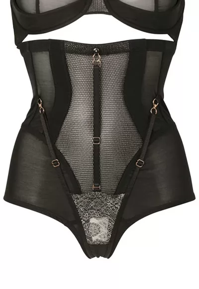 You can wear the Josephine brief day or night. You will be sublimated thanks to the cutouts and the mixture of opaque lycra and transparent mesh. Composed of 16% elastane, this very high waist thong-shaped panty will shape your curves and make you feel sexier.  The mid front and back are layered with a silver fishnet and black 3D fishnet overlay. The...