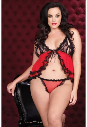 Peek-a-boo spanish lace babydoll and matching g-string. Cami top with black lace cups and ruffled trim, fly away lace tie front and a matching lace trimmed thong. Plus size sexy babydoll. Color : black, red. Material: 100% Nylon. 8906 Leg Avenue. 2 pieces.