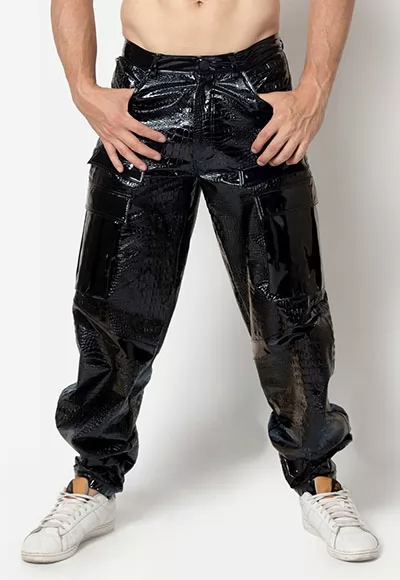 Ragnar vinyl trousers wide cut in black color.  Manufactured in French workshops, signed by renowned fashion designer Patrice Catanzaro, available in size 38 to 50. Composition : 80% Polyester, 12% Polyurethane, 8% Elastane.  Brand Patrice Catanzaro, Collection Homme 6, Reference PC514701H6 1 piece.  Patrice Catanzaro, the brand of sexy outfits of very...