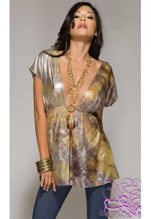 This v neck tunic with a plunging neckline is both artsy and flirtatious! The metallic fabric and empire waistline will flatter your figure and highlight your assets! 95% Polyester, 5% Spandex. Made in USA