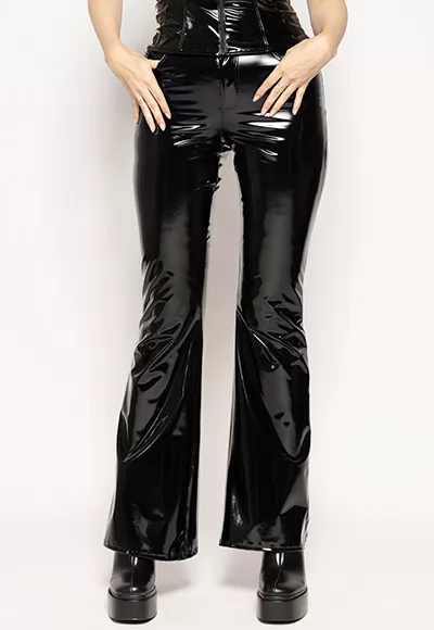 Stratosphere bootcut vinyl trousers in black color.  Manufactured in French workshops, signed by renowned fashion designer Patrice Catanzaro, available in size 36 to 48. Composition : 80% Polyester, 12% Polyurethane, 8% Elastane.  Brand Patrice Catanzaro, Collection Tome 18, Reference PC506404T18.2 1 piece.  Patrice Catanzaro, the brand of sexy outfits...