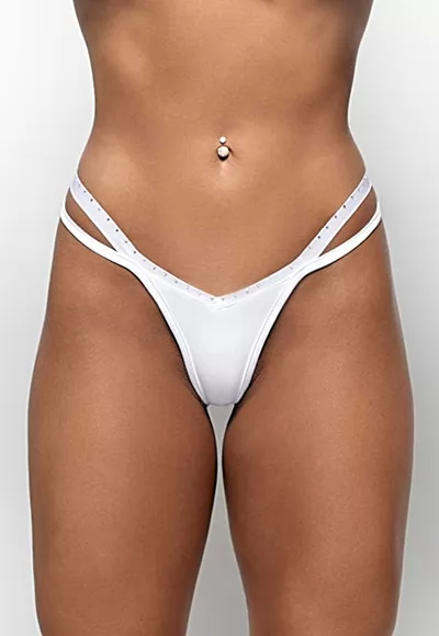 The white Texas thong has an original and sexy cut, with two stretchable straps on the sides, one of which is decorated with shiny rhinestones to catch the eye and a slightly V-shape.  At the back of the white Texas thong, the thong cut is very sexy with a ring in the small of the back. Soft and comfortable lycra thong.  Coordinate the white Texas thong...