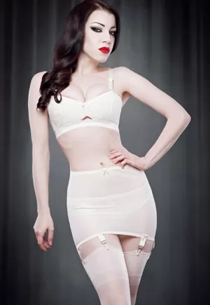 Vargas Roll On Girdle in Ivory. A sleek and chic roll on girdle, no fastenings, made from control mesh to hold your body. Six metal garters hold up your stockings, and two tiny bows finish the front. Vargas Girdle By Kiss Me Deadly. Vintage Femme Fatale Style, Classic Pin-up. 1 piece.