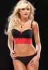 Black balconette bra with red lace