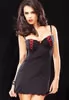 Black Chemise with red lacing on balcony