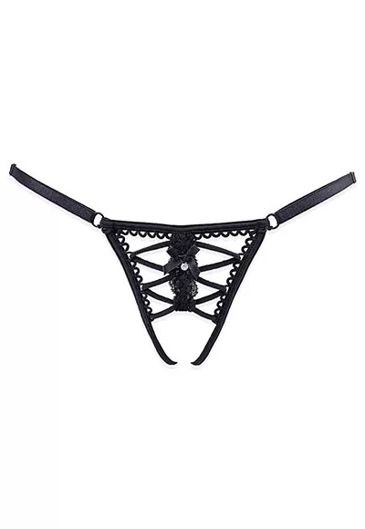 Le String nu Capeline est un bijou de peau dévoilant votre intimité avec beaucoup d'élégance. Un laçage satiné parcourt le pubis, divisé au centre par une ligne de dentelle. Au coeur de celui-ci, un délicat noeud satiné orné d’un pendentif en cristal attire le regard.  Sur les côtés, une bande élastiquée est réglable en taille grâce...